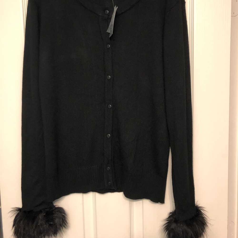 Large button up black sweater with fur